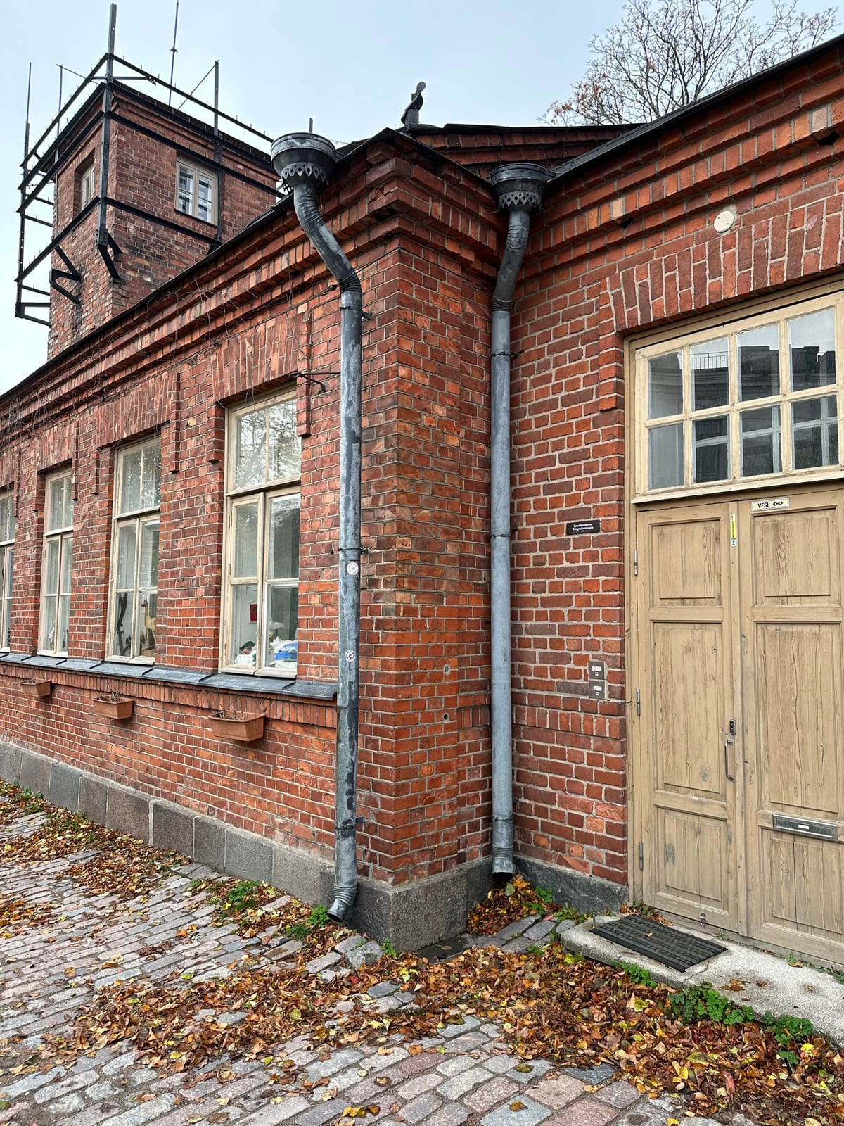 A brick and mortar building from the center of the island.