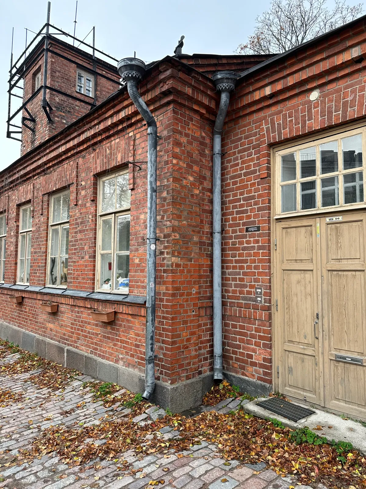 A brick and mortar building from the center of the island.