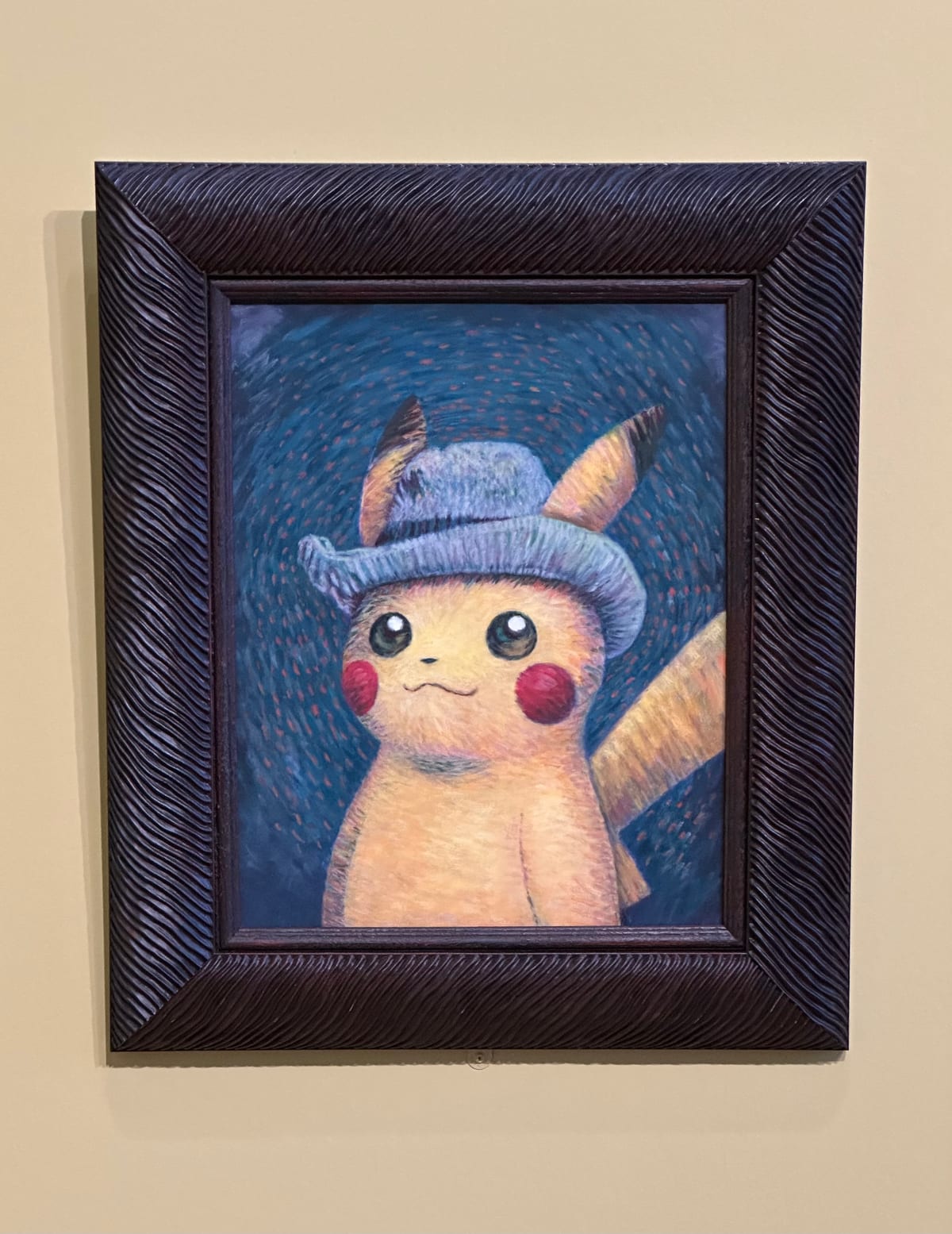 Pikachu with a hat, drawn in the style of Van Gogh